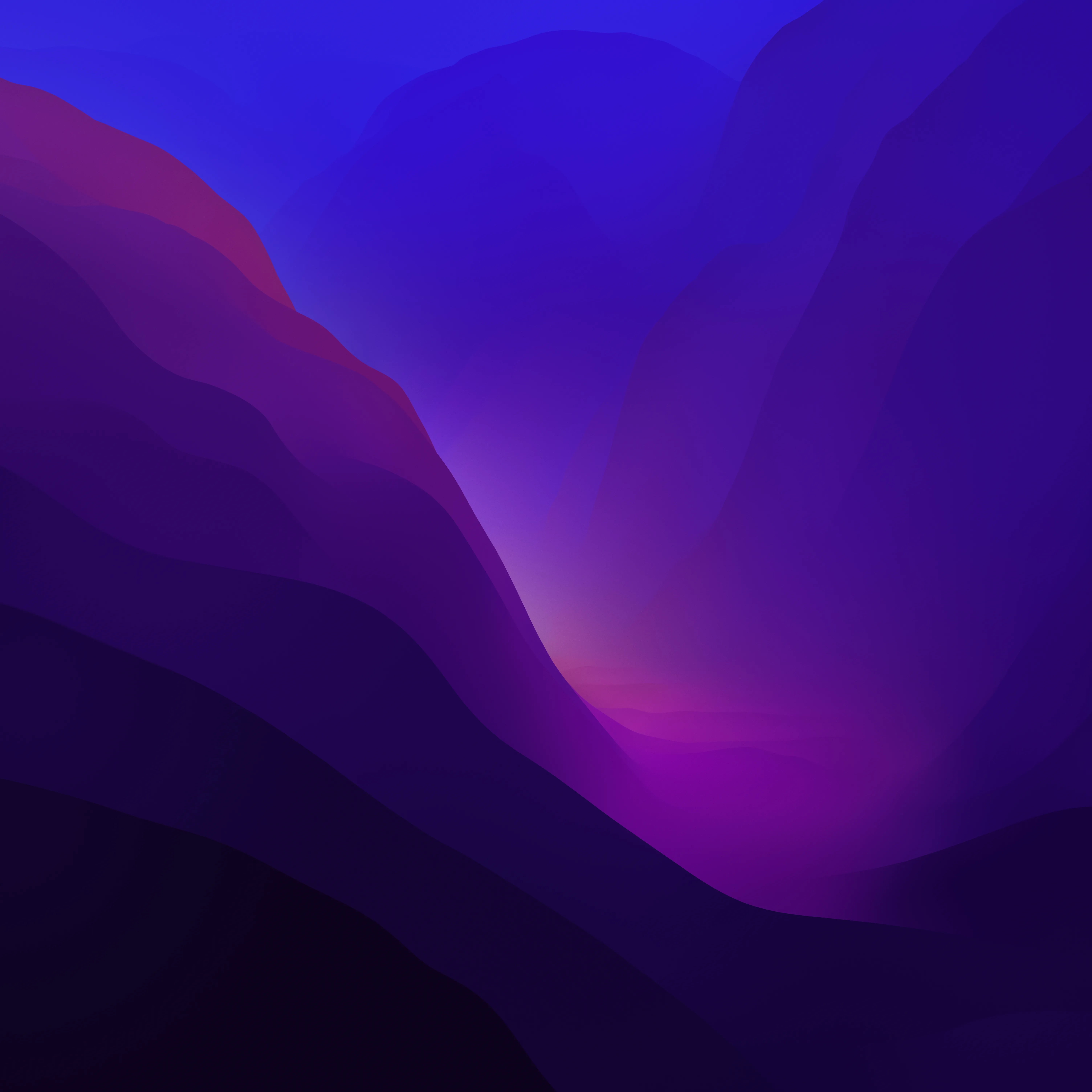 macOS Monterey dark mode wallpaper.